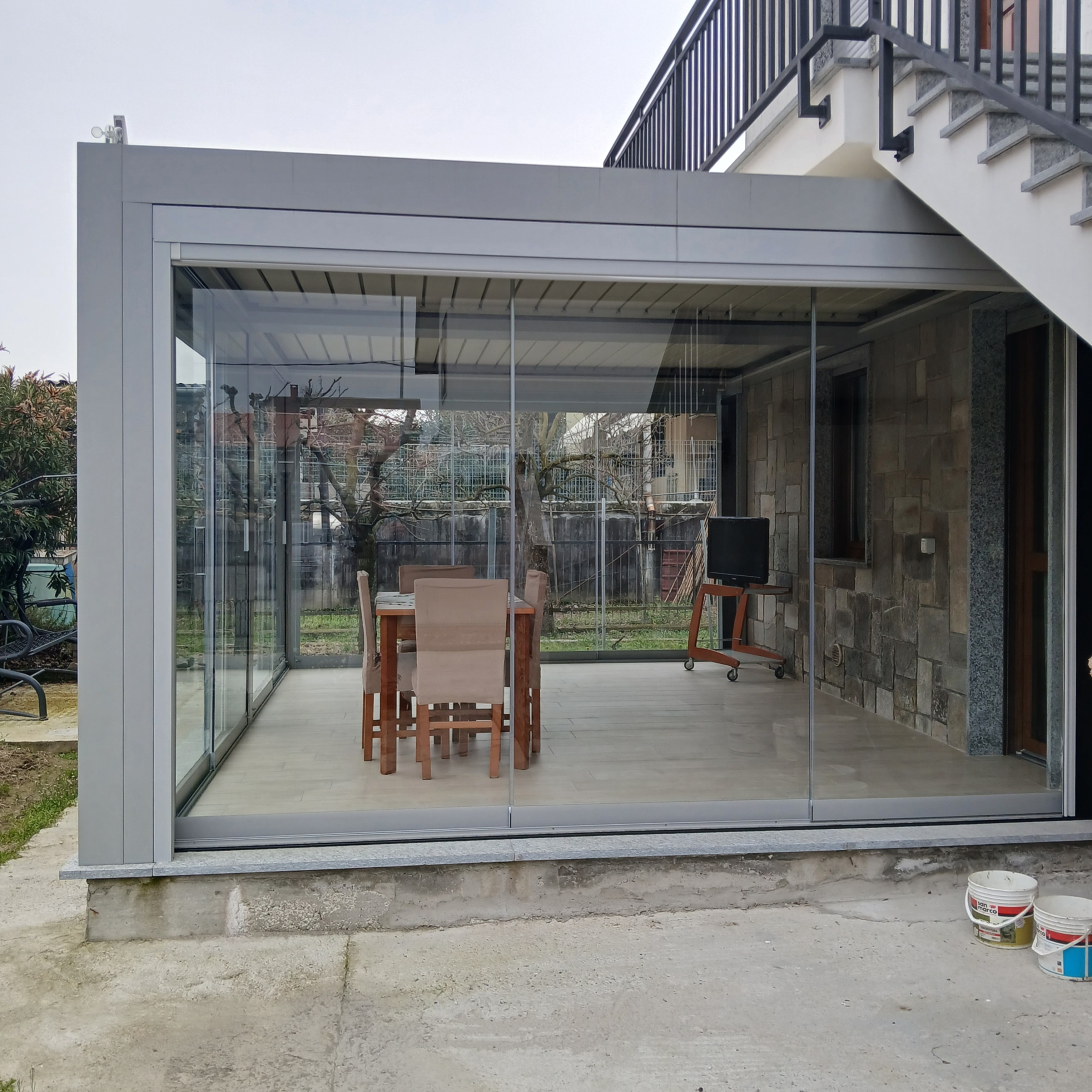 Fornitura e installazione pergola bioclimatica con basamento e pavimentazione - Settimo Torinese - ReBuild